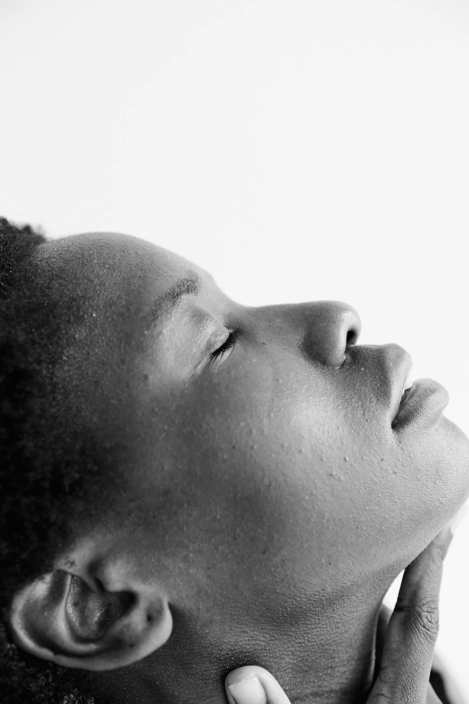 Portrait of a woman against a white background
